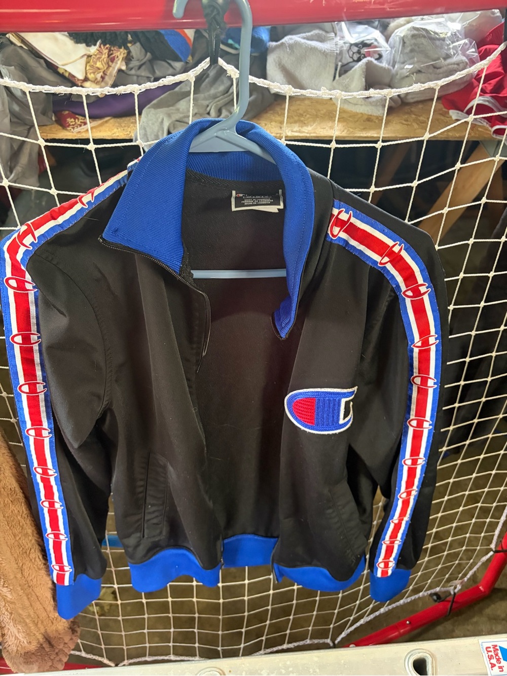 Champion Black Jacket with Blue Collar and Red & Blue Sleeve Trim